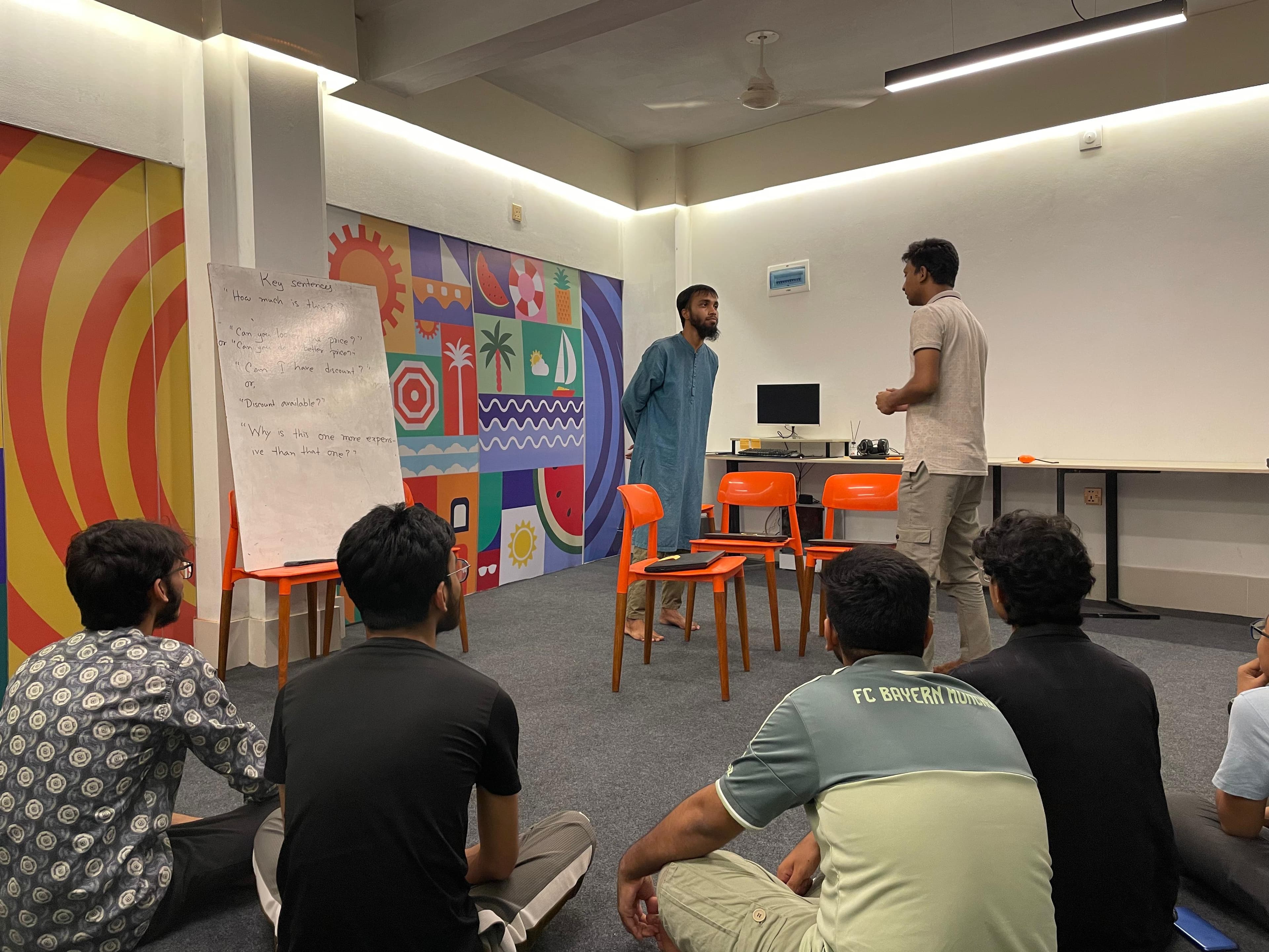 Students practicing English communication in a Witen Academy class